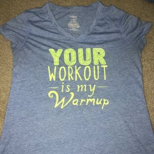 Blue short sleeve athletic shirt.